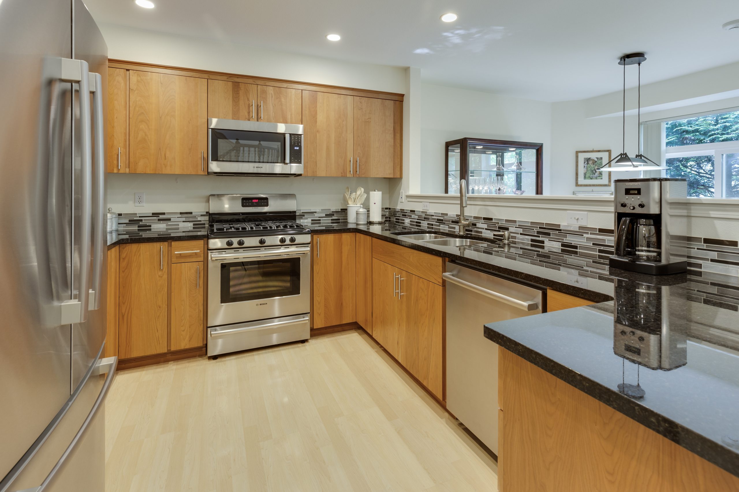 Kitchen with black countertop