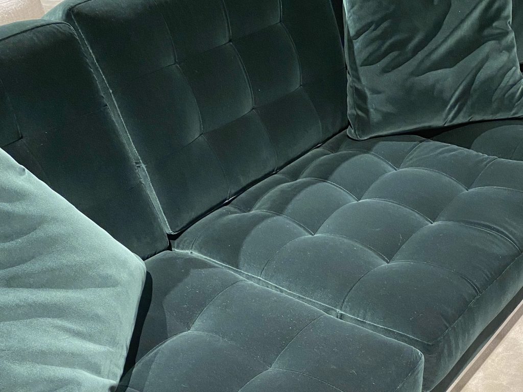 Green velvet sofa